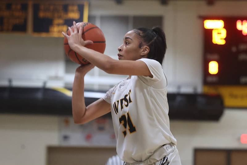 Joliet’s Alaya Redditt puts up the three point shot against Plainfield East on Tuesday, Feb. 6th 2024 in Joliet.