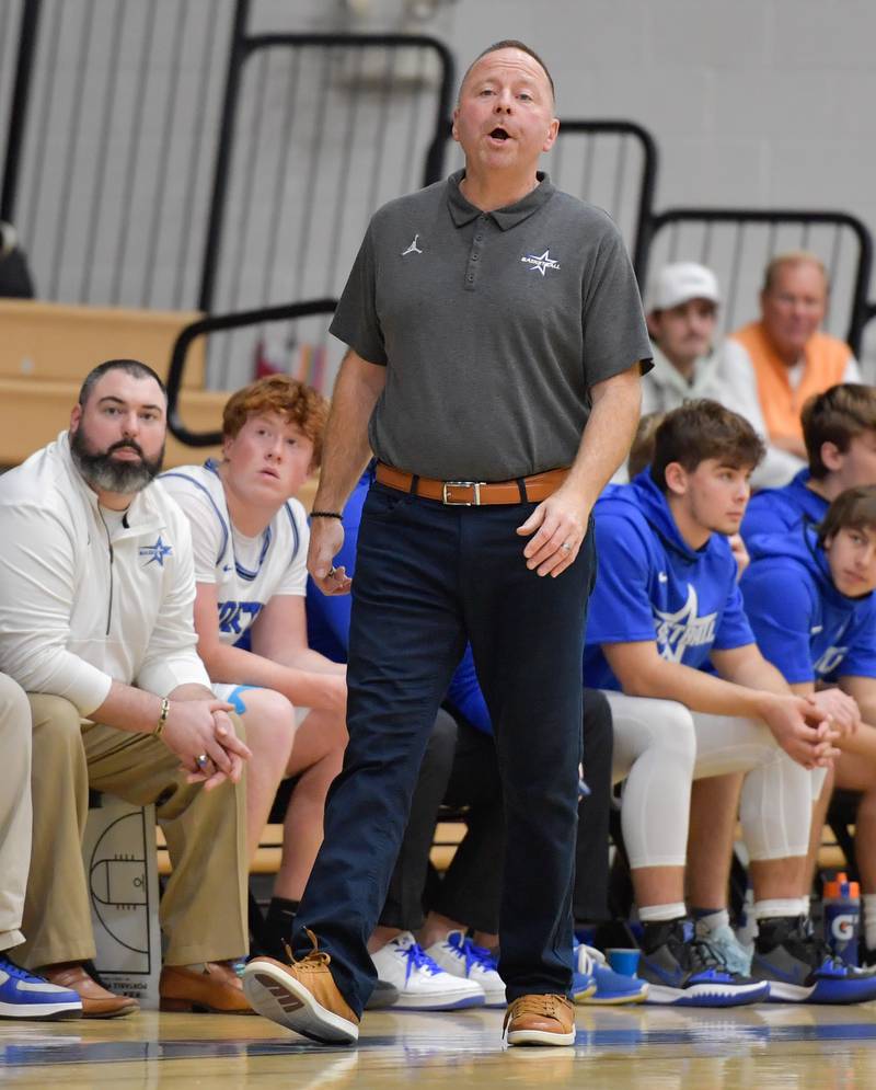 St. Charles North's head coach Tom Poulin during a game against on Friday, December 2, 2022.