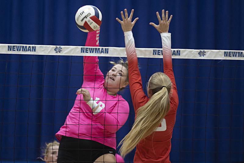 Newman’s Kennedy Rowzee hammers a shot against Oregon’s Skylar Bishop Wednesday, Sept. 6, 2023 in a game at Newman High School.