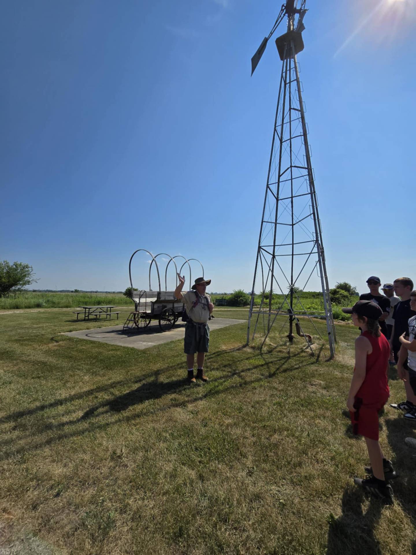 Prairie Partner Chris Danek, on left side of the photo, led a hike for the Burgess family.