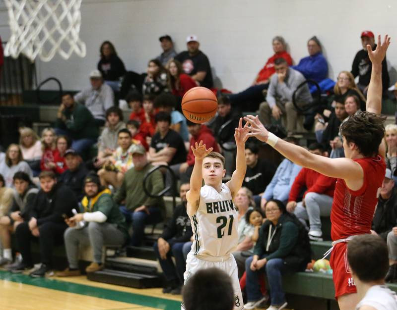 St. Bede's Alex Ankewicz (left) shoots and misses a three while Hall's Ashton Pecher (right) defends on Monday, Dec. 14, 2022 at St. Bede Academy.