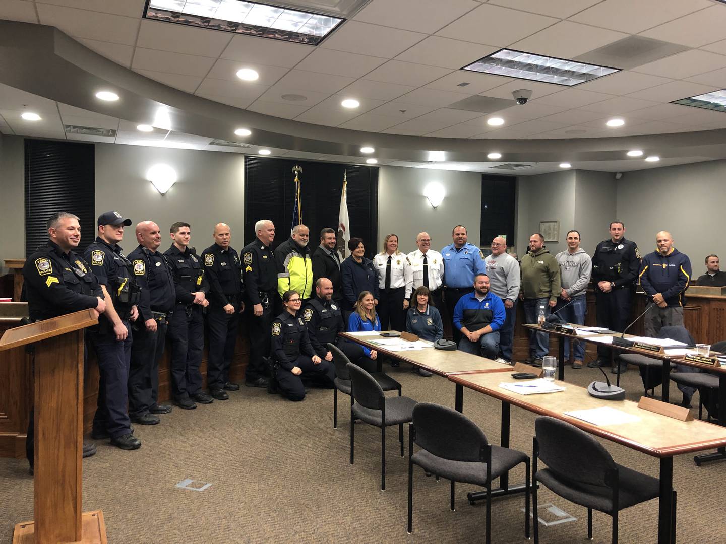 Newly appointed Police Chief Sarah Raymond poses for a photo with her fellow officers on Monday, Nov. 21, 2022.