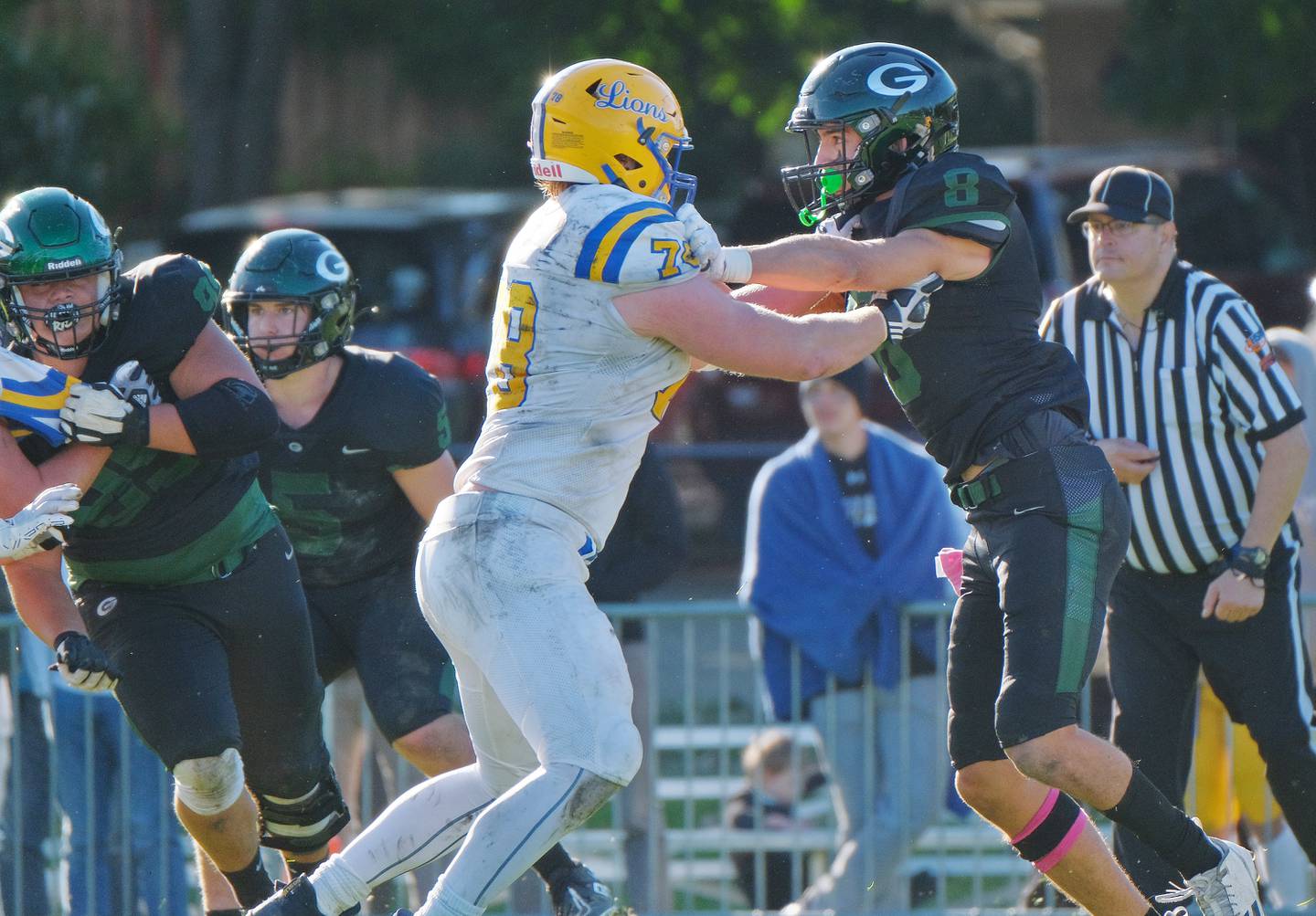 Glenbard West's Filip Maciorowski (8) engages with Lyons Township's Eddie Tuerk during a game on Oct. 15, 2022 at Glenbard West High School in Glen Ellyn.