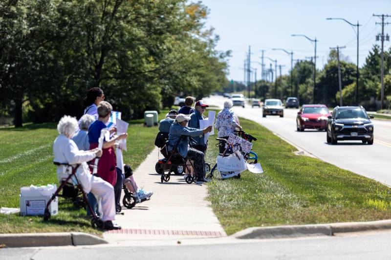 ‘Workers Over Billionaires’ Labor Day Protest participants spread their message on the 1100 block of N. River Rd. in Shorewood, IL, on Sept. 1, 2025.