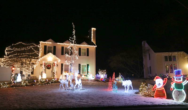This home has Christmas decorations in the front and back on Tuesday, Dec. 20, 2022 located at 225 28th Street in Peru.