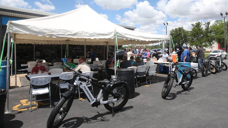 Dozens of people attend the benefit to help Princeton youth baseball and softball leagues on Wednesday, May 29, 2024 at Princeton Chevrolet GMC. All food and drinks were donated by Princeton Chevrolet GMC for the fundraiser.