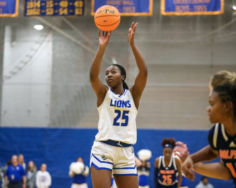 Lyon's Nora Ezike (25) shoots a free throw during their Class 4A Lyons Sectional semifinal basketball game between Lyons vs Young. Feb 25, 2025 in La Grange.