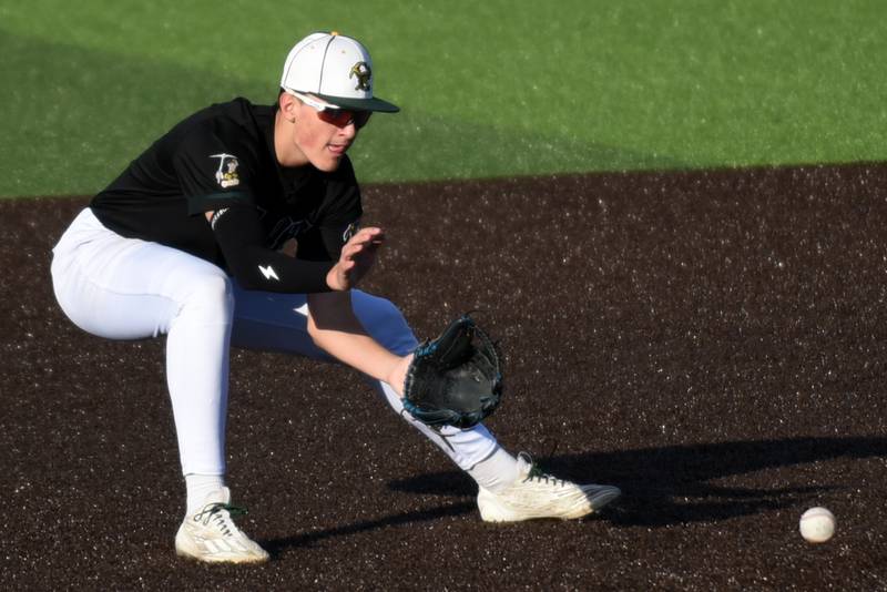 Coal City's Kellen Forsythe fields a ground ball during a game at Herscher Monday, April 20, 2026.