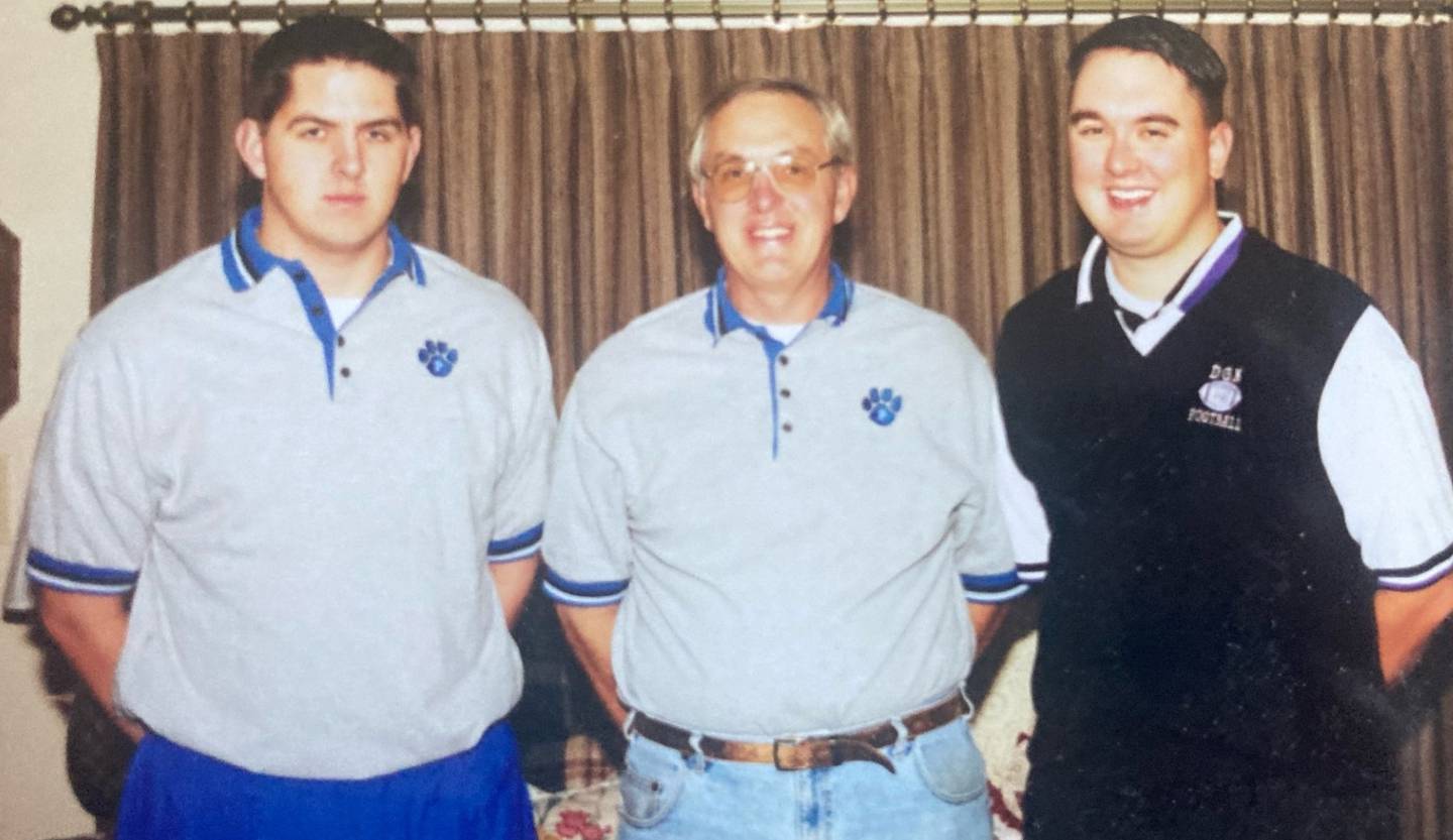 Charlie Waca (center), shown with his sons, Eric (left) and Chris), is being inducted into the IHSFCA Hall of Fame as the Class of 2026. He has 38 seasons as an assistant with tenures at Tiskilwa, Princeton and Kewanee.