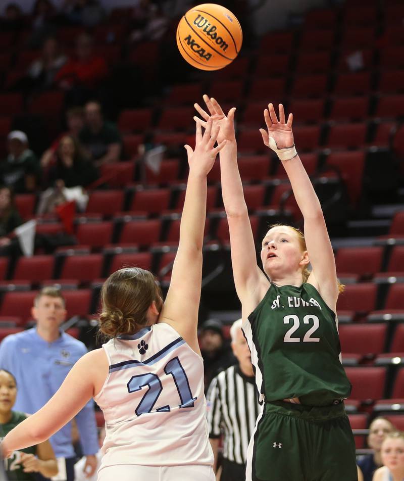 St. Edward's Layne Dawson lets go of a shot over Cissna Park's Lauryn Hamrick during the Class 1A third place game on Friday, March 7, 2025 at CEFCU Arena in Normal.