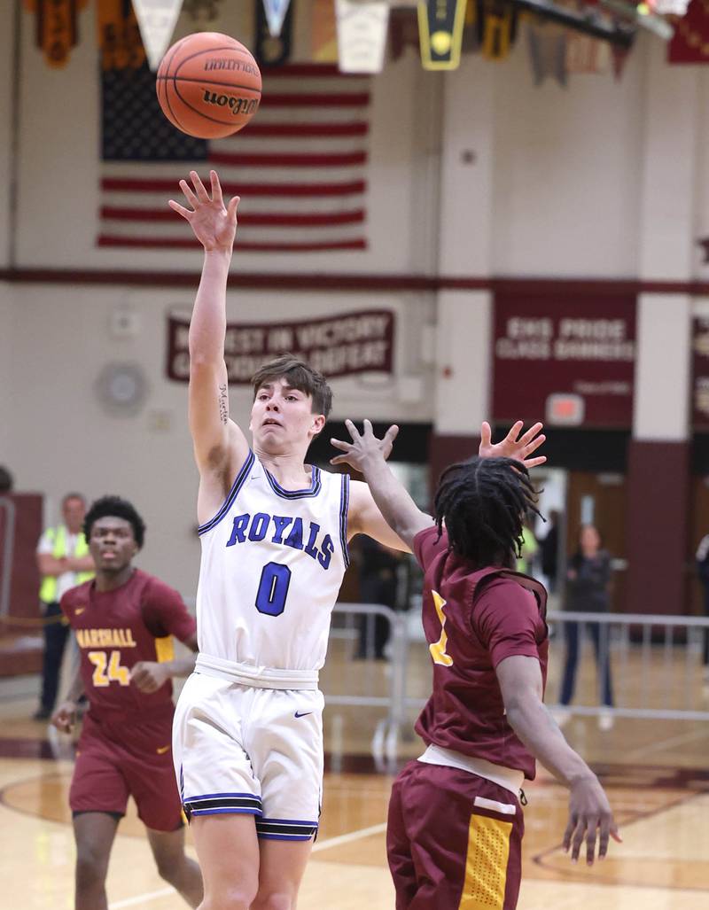 Hinckley-Big Rock's Landon Roop shoots over a Chicago Marshall defender in the lane Wednesday, March 1, 2023, during their Class 1A sectional semifinal matchup at Elgin High School.