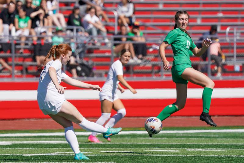 York’s Jordan Ebner (13) defends against a shot attempt by Lyons’ Izzi Wirtz (12) during a Class 3A Hinsdale Central Sectional girls soccer championship match at Hinsdale Central High School on Saturday, May 25, 2024.