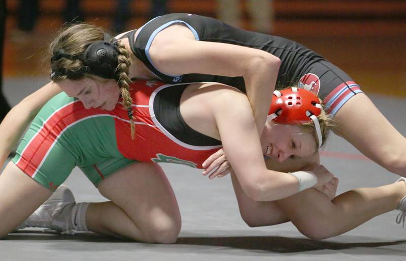 Ottawa's Savannah Frederickson and L-P's Kalli Ware wrestle on Thursday, Jan. 9, 2025 in Sellett Gymnasium at L-P High School.