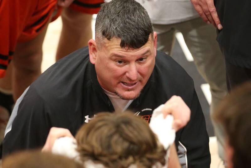 Flanagan-Cornell head boys basketball coach Brian Yoder talks to his players during a timeout against Woodland during the Route 17 Classic Tournament on Wednesday, Nov. 27, 2024 at Woodland High School.