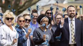 Dixon’s Hands Around the Courthouse aims to raise child abuse prevention awareness