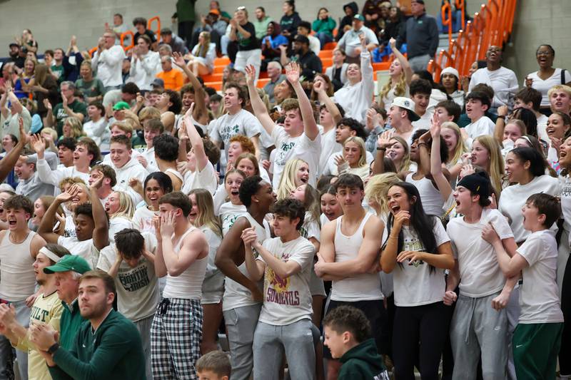 Bishop McNamara's student section celebrates as the the Fightin' Irish started to come back in the fourth quarter during their 77-70 loss to Tolono Unity in the IHSA Class 2A Pontiac Supersectional on Monday, March 9, 2026.