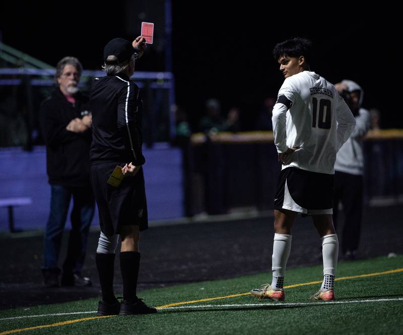 Herscher's Luis Parra is shown a red card after drawing a second yellow card in a sectional game against Coal City on Tuesday, October 28, 2025.