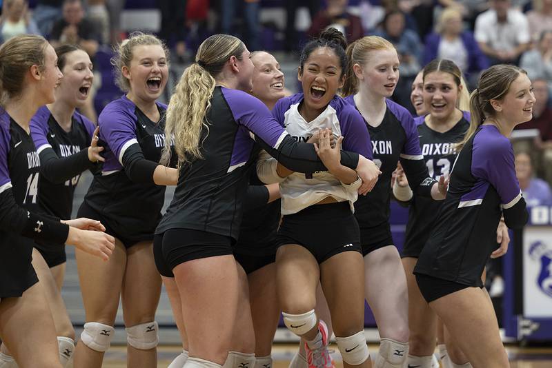 Dixon volleyball celebrates their two-set win over top-seeded L-P Tuesday, Oct. 29, 2024, at the class 3A regional semifinal in Dixon.