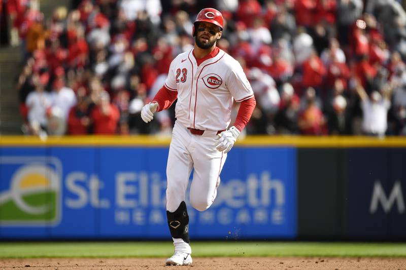 Cincinnati Reds' Nick Martini rounds the bases after hitting a two-run home run during the second inning against the Washington Nationals in Cincinnati, Thursday, March 28, 2024.