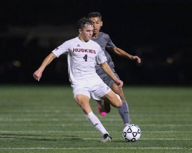 Naperville North's Connor Hanrahan (4) races down the pitch during soccer match between Naperville North at Morton.  Sept 21, 2023.