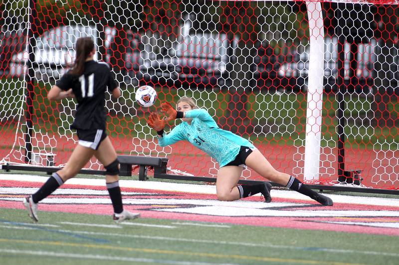 Fenwick goal keeper Audrey Hinrichs (31) makes a save during their IHSA Class 2A State consolation game against Deerfield at North Central College in Naperville on Saturday, June 4, 2022.