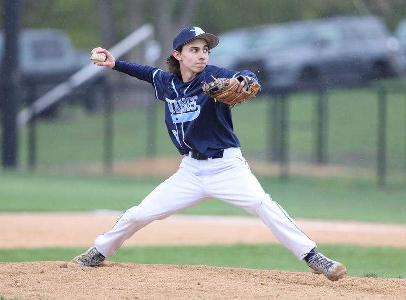 Downers Grove South's Joey Sperando (30) throws a pitch during the varsity baseball game between Downers Grove South and Downers Grove North in Downers Grove on Saturday, April 29, 2023.