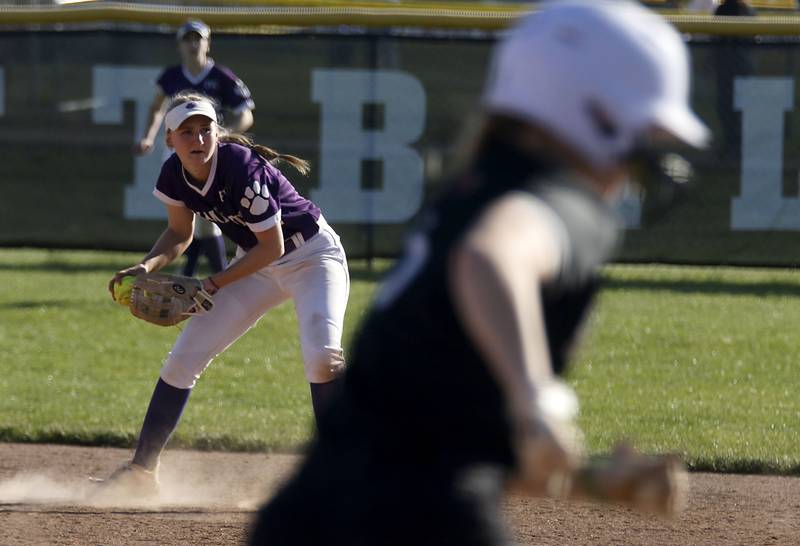 Hampshire's Ali LeBlanc fields the ball before throwing Huntley's Morgan Bzdusek out at first base during a Fox Valley Conference softball game on Thursday, May 14, 2026, at Huntley High School.