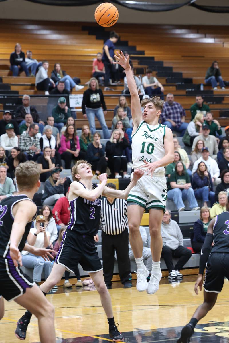 Bishop McNamara's Coen Demack shoots from the paint during the Fightin' Irish's 66-52 victory over El Paso-Gridley in the IHSA Class 2A Herscher Regional championship on Friday, Feb. 27, 2026.