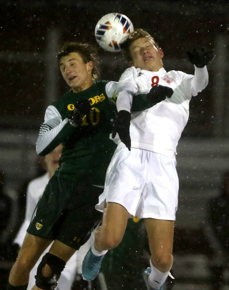 Crystal Lake South's Nolan Getzinger and Timothy Christian's Trevor Munk head the ball during the IHSA Class 2A Grayslake Central Supersectional soccer match on Tuesday, Oct. 31, 2023, at Grayslake Central High School.
