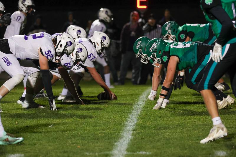 The El Paso-Gridley Titans (at left) line up against the Seneca Fighting Irish defense Friday, Nov. 1, 2024, in Seneca.