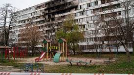 Russian attacks kill at least 7 in Ukraine as talks on peace plan continue