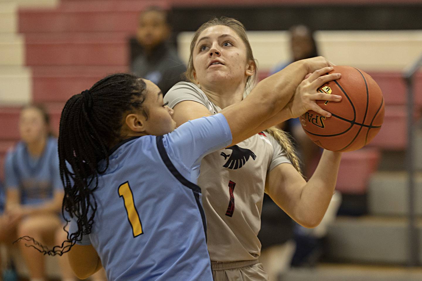 Sauk Valley College’s Hadley Lutz gets fouled by Rock Valley’s Alicia Bates Tuesday, Nov. 21, 2023 at SVCC.
