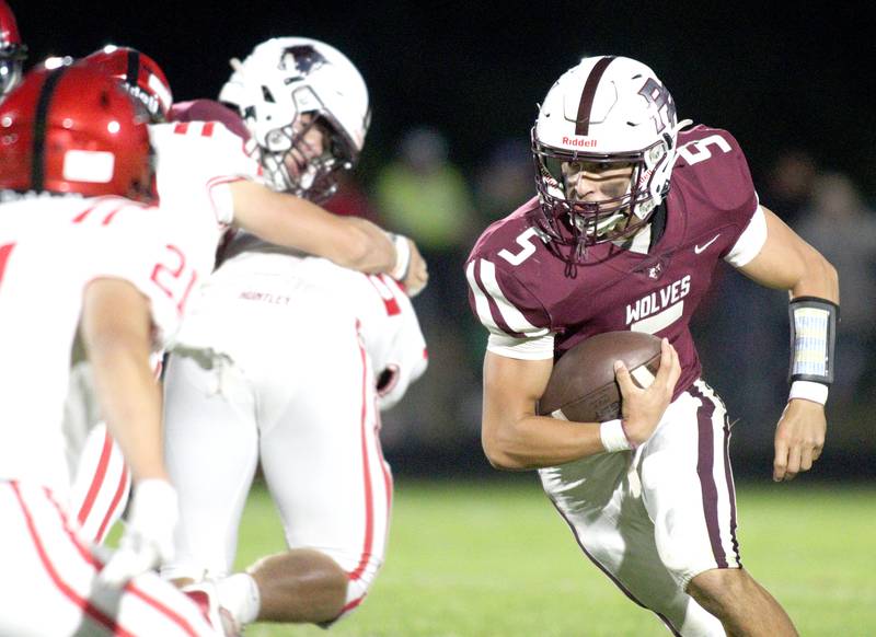 Prairie Ridge’s Joseph Vanderwiel looks for an opening against Huntley in varsity football at Crystal Lake Friday night.