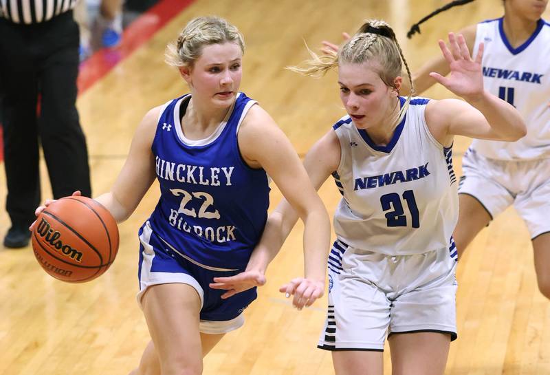 Hinckley-Big Rock's Anna Herrmann drives against Newark’s Addison Ness Thursday, Jan. 18, 2024, during the Little 10 girls basketball tournament at Indian Creek High School in Shabbona.