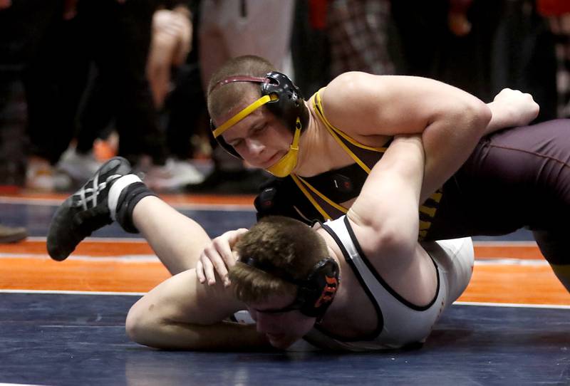 Montini's Jaxon Lane controls Washington's Wyatt Leman during the 215-pound match during the IHSA Class 2A Dual Team Sate Championship match Saturday, Feb. 24, 2024 at Grossinger Motors Arena in Bloomington.