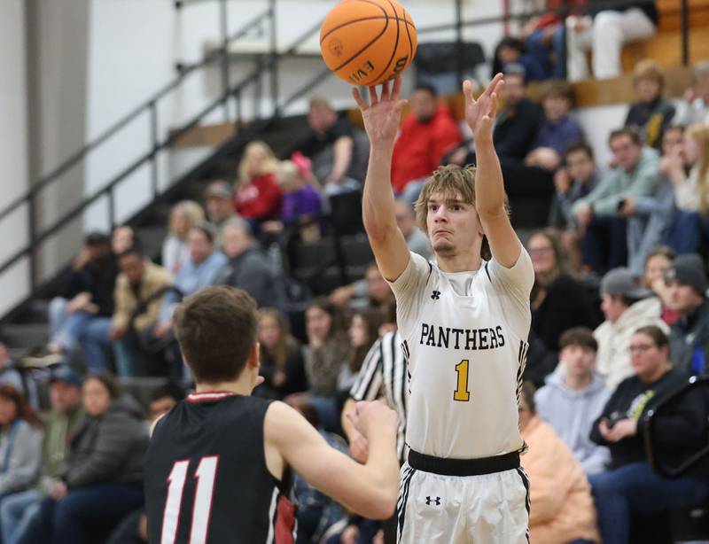 Putnam County's Jacob Furar shoots a jump shot over Henry-Senachwine's Landon Harbison on Friday, Dec. 5, 2025 at Putnam County High School.
