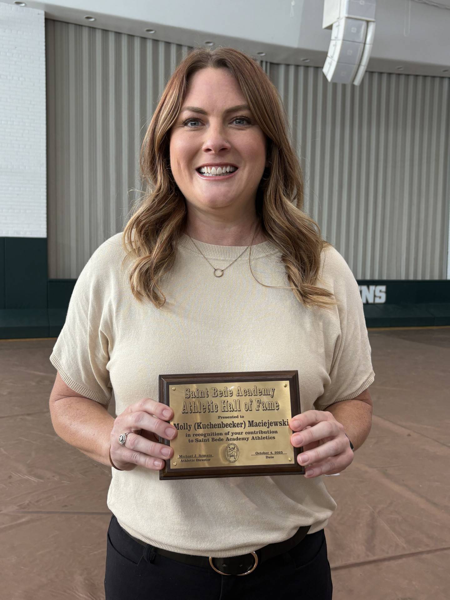 Molly Maciejewski, a 2002 alum and MVP of the Lady Bruins basketball and volleyball teams, was inducted into the St. Bede Hall of Fame.