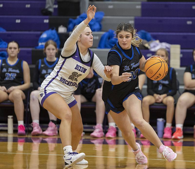 St. Francis’ Alyssa Freeman dribbles against Dixon’s Reese Dambman Saturday, Jan. 10, 2026.