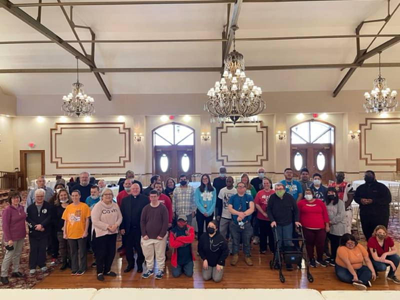 Members of multiple Joliet-area organizations, including All Saints Greek Orthodox Church in Joliet, the Kiwanis Club of Joliet, the Kiwanis’ Aktion Club and Aktion Angels Club and the Greater Joliet Area YMCA, worked together to purcahse the items for and then assemble 300 hygiene kits for the Ukranian refugees. Pictured are volunteers from the packing event at the Jacob Henry Mansion Estate in Joliet.