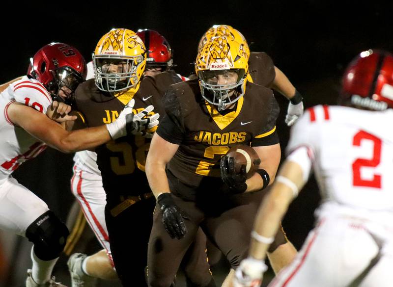 Jacobs’ Caden DuMelle looks for running room against Huntley in varsity football at Jacobs High School in Algonquin on Friday, Sept. 26, 2025.