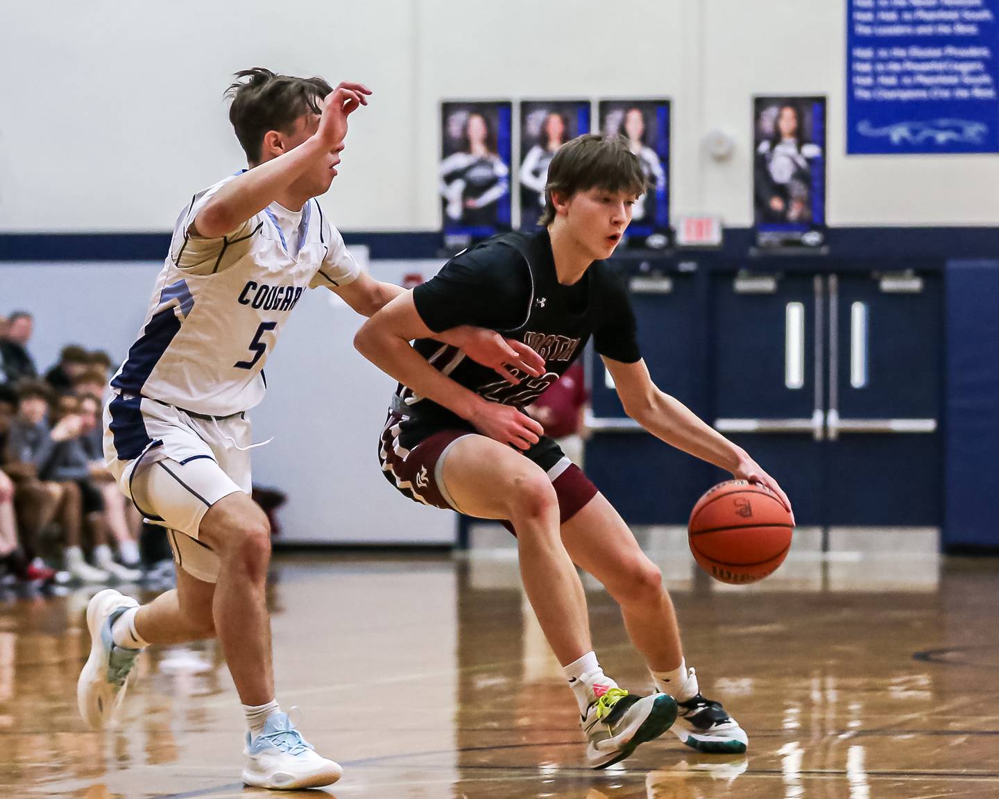 Plainfield North's Evan Czarnik (22) makes a move at the top of the key during basketball game between Plainfield North at Plainfield South. Jan 5, 2024.