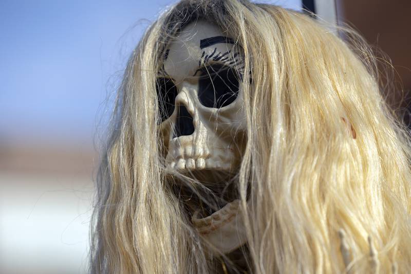 A terrifying skeleton points the way to fashionable deals Thursday, Oct. 16, 2025, in Dixon.