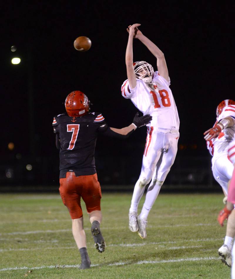 The ball goes over the head of Morrison's Carson White (18) against the Fulton Steamers on Friday, Oct. 25, 2024 in Fulton. The Steamers won the game 41-7.