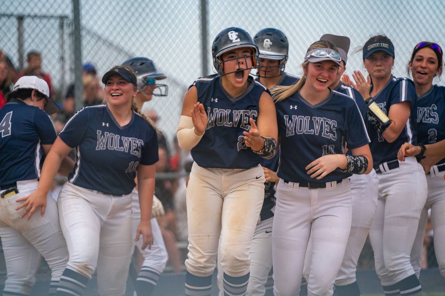 Oswego East's Mia Corres (21) reacts after homering against Yorkville during the Class 4A Oswego softball sectional semifinal game between Yorkville and Oswego East at Oswego High School on Tuesday, May 30, 2023.