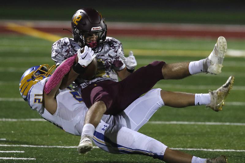 Johnsburg's Nicholas LoPresti tackles Richmond-Burton's Nick Falasca during a Kishwaukee River Conference football game Friday, Oct. 7, 2022, between Richmond-Burton and Johnsburg at Richmond-Burton Community High School in Richmond.