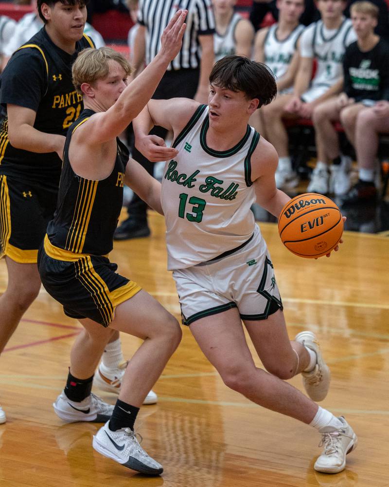 Phillip Griffith Jr. (13) of Rock Falls drives ball in lane during the Calmone Classic on Monday, December 8, 2025 at Hall High School in Spring Valley.