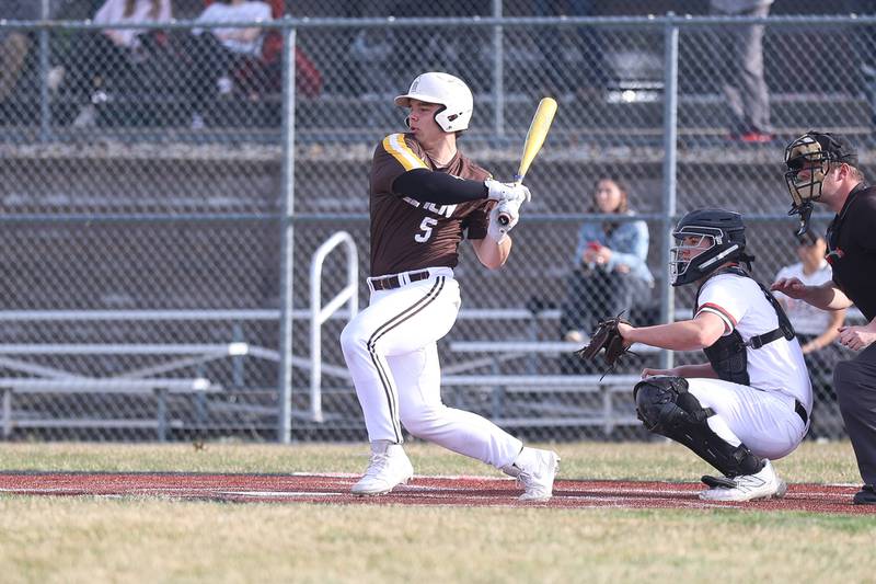 Joliet Catholic’s Derrick Pomatto connects for a RBI single against Lincoln-Way Central on Wednesday, March 25, 2026 in New Lenox.