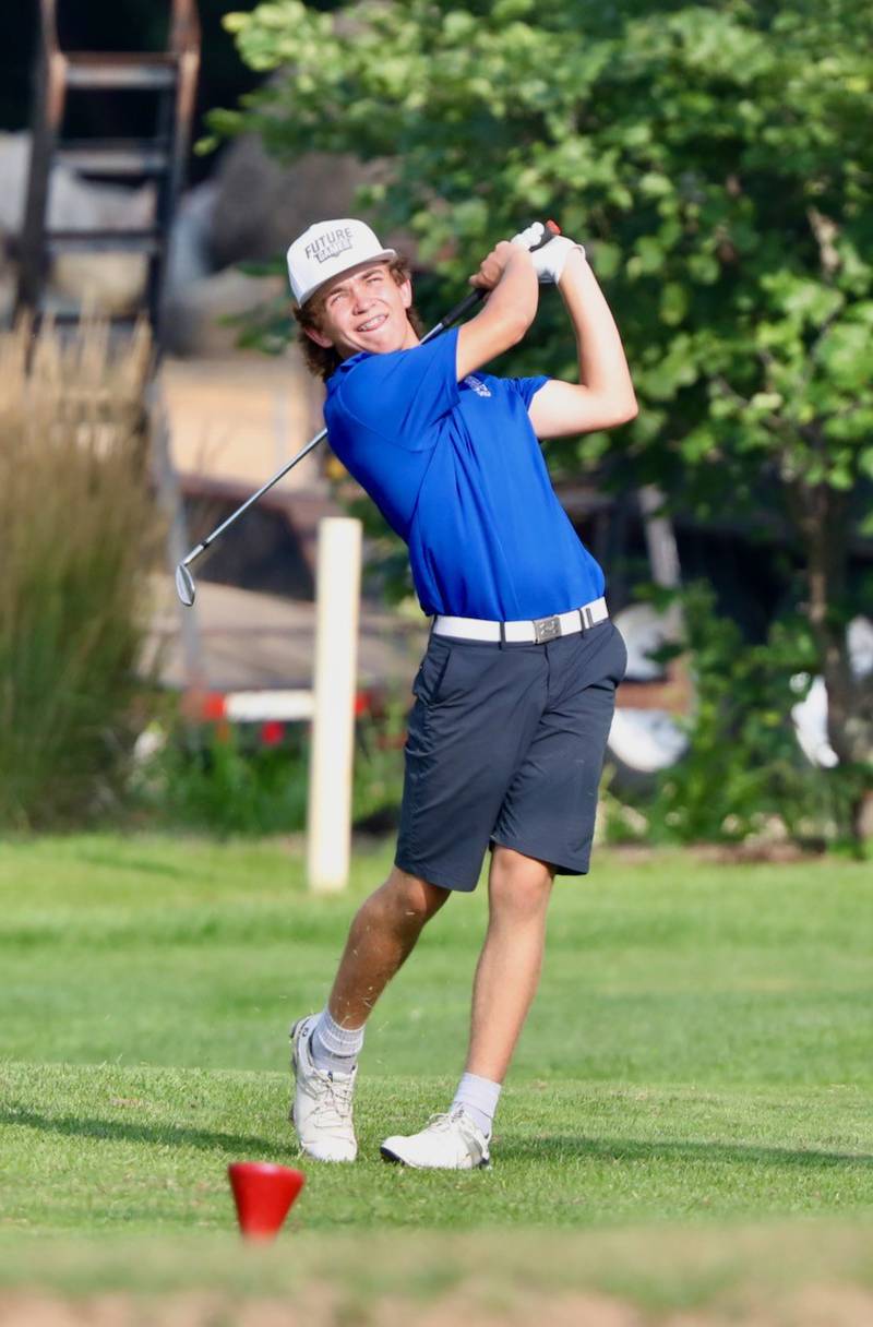 Newman's Garet Wolfe tees off Monday at Wyaton Hills Golf Course in Princeton.