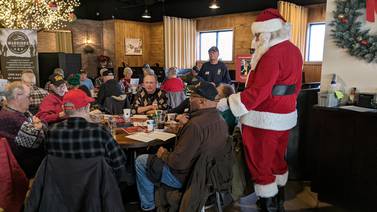 ‘It’s about the community’ -Veterans ring in the holidays at special breakfast in downtown Oswego 