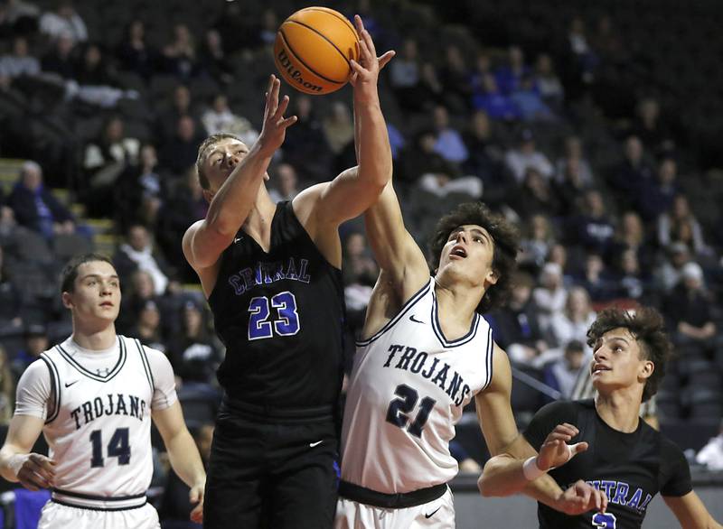 Burlington Central's Jacob Johnson battles with Cary-Grove's Brady Elbert for a rebound during a Fox Valley Conference basketball game on Tuesday, Jan. 14, 2025, at Now Arena in Hoffman Estates.